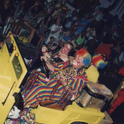 Unknown people dressed up on a float.