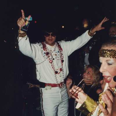 Unknown man dressed up as Elvis.