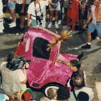 A little pink car in the parade.
