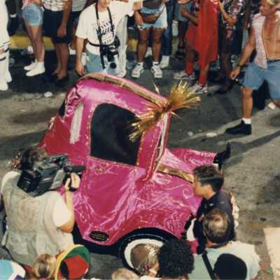 A little pink car in the parade.