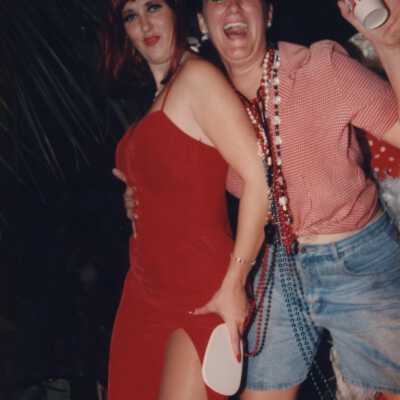 Unknown people dressed up on a float.