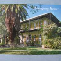          Hemingway House with First Day Issue Ernest Hemingway Stamp; © Key West Art & Historical Society
   