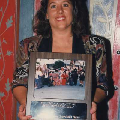 Unknown woman with a plaque.