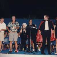 A group of unknown people on the stage.
