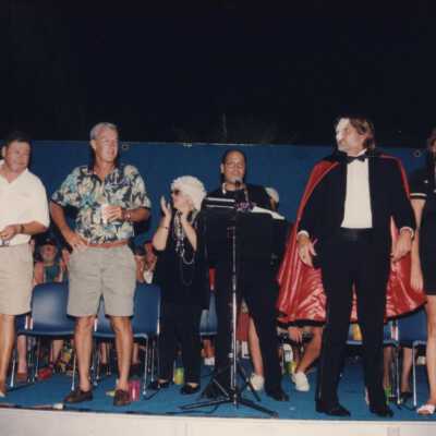 A group of unknown people on the stage.