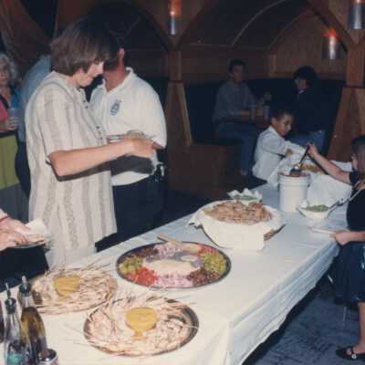 Unknown people eating at the award ceremony.