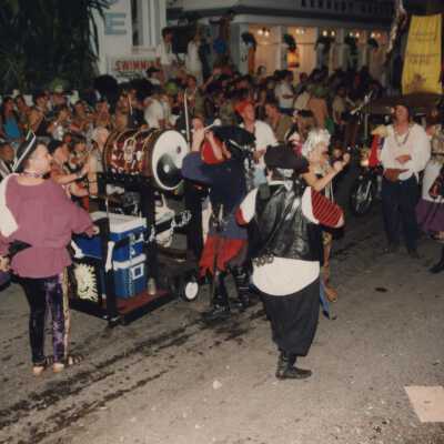 Unknown people walking in the parade.