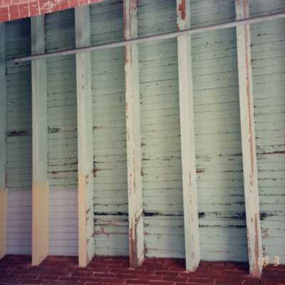 Wood on one of the walls.