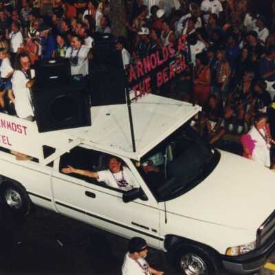 A float in the parade that reads Arnolds at the beach.