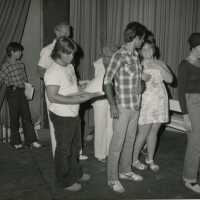 A group of people standing around