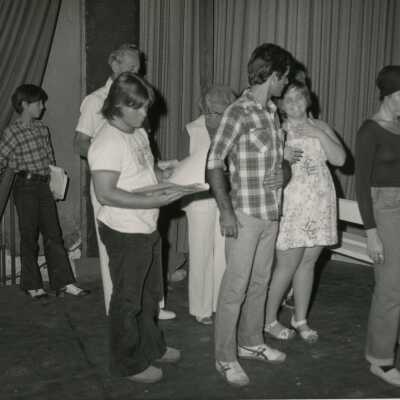 A group of people standing around