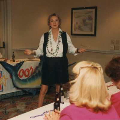 Unknown woman talking at the Coors light parade workshop.