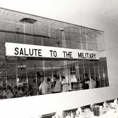 A sign reading "Salute to the Military": Copyright: © Key West Art & Historical Society; Origformat: Print-Photographic