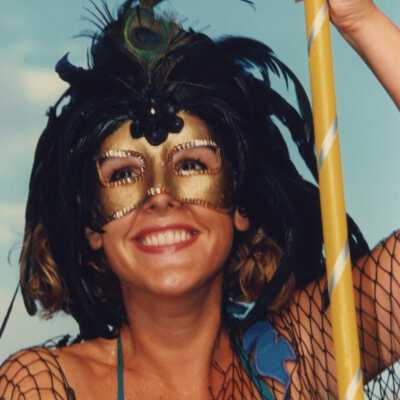 Unknown lady dressed up for the Masquerade March.