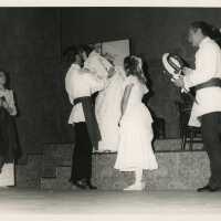 An unknown group of people in a play