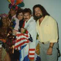 A group of unknown people dressed up.