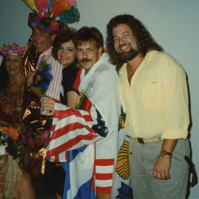 A group of unknown people dressed up.