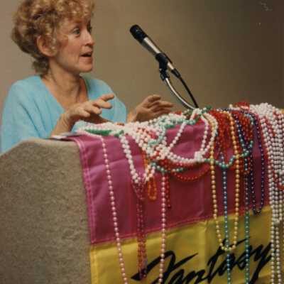 Unknown woman talking at the Coors light parade workshop.
