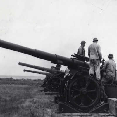 Military Servicemen with Cannons