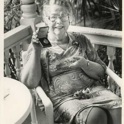 Unidentified Woman Posing with a Necklace