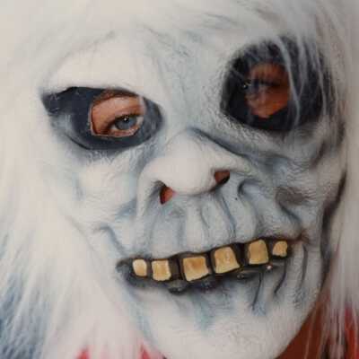 Unknown person wearing a mask.