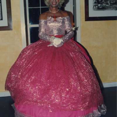 Unknown man dressed up as a woman at the Coronation Ball.