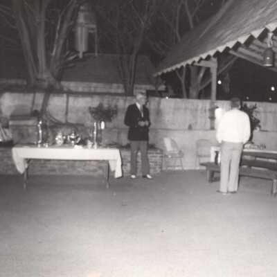 Unknown trio at outdoor event