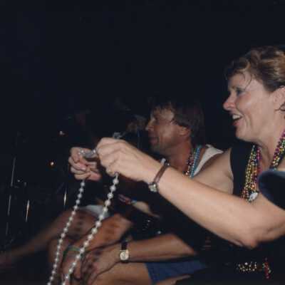 Unknown people watching the parade.