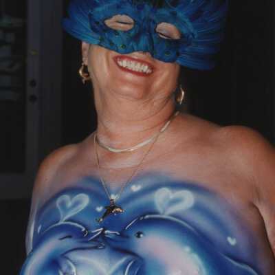 Unknown lady with her breast painted.