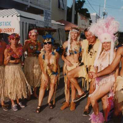 A group of unknown people dressed up.