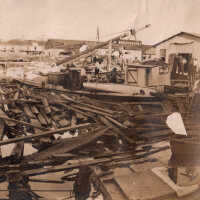 Damaged boat and pier