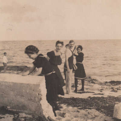 Group of women and men in bathing suits