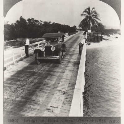 Men and a car on the Boca Chica Bridge