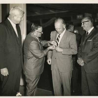 4 Unknown men in suits