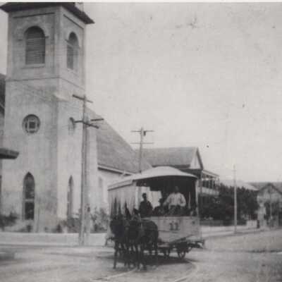 Mule-drawn streetcar near the Old Stone Methodist Church