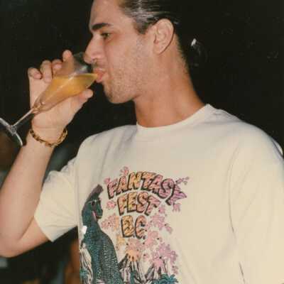 Chris Vidal wearing a FF shirt and drinking champagne.