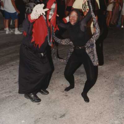 Unknown people dressed up.