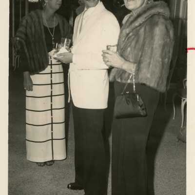 Unknown people standing around