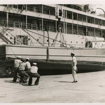 U.S. Navy Men with Launch