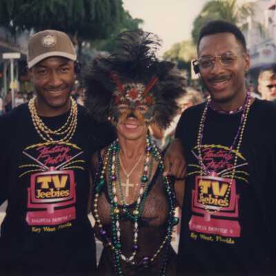 Unknown people standing on Duval Street.