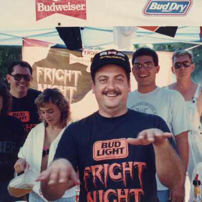 Unknown people working a booth.