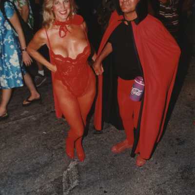 Two unknown people dressed up as devils.