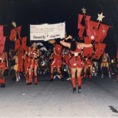 Shape U family fitness people walking in the parade.