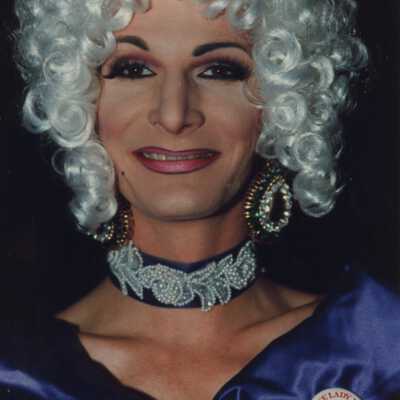 Unknown person dressed up for the Coronation Ball.