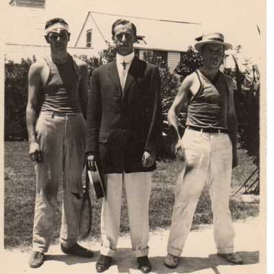 Unknown men with tennis rackets