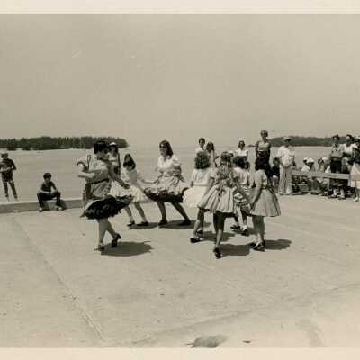 Unknown people dancing during a ceremony