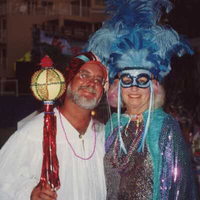 Two unknown people dressed up.