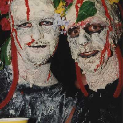 Unknown people dressed up.