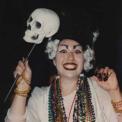 An unknown lady dressed up.