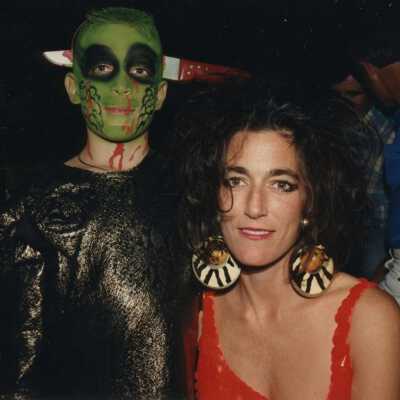 Two unknown people dressed up.